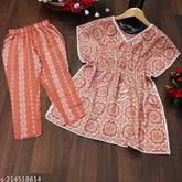 Orange rayon kaftan and trousers set for girls party, festive printed design