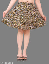 Printed polycrepe mini skirt, vibrant patterned skirt for women's casual or evening wear. High-waisted skater style with various size options available. Made in India