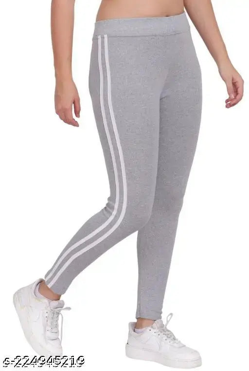White cotton blend printed net jeggings for women, soft, stretchy, and comfortable with elastic closure and breathable fabric, suitable for outdoor or casual wear. Made in India