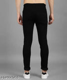 Black polycotton, full-length, mid rise men's jeans with light wash, solid pattern. Made in India, size 28 (28in waist, 36in length), suitable for trendy menswear