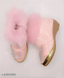 Pink canvas and PU party shoes for infant girls, zip detail and multiple designs, available in pink, black, coral; size: 6 Months (foot length 10.3cm), 8 Months (foot length 11cm), 10-12 Months (foot length 11.4cm), 1 year (foot length 11.7cm), 1.5 years (foot length 12.1cm), 2 years (foot length 14.1cm), 2.5 years (foot length 14.7cm); made in India