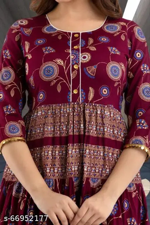 Maroon rayon anarkali gown for women, three-quarter sleeves, printed design. Perfect for casual and regular wear, comfortable all day long