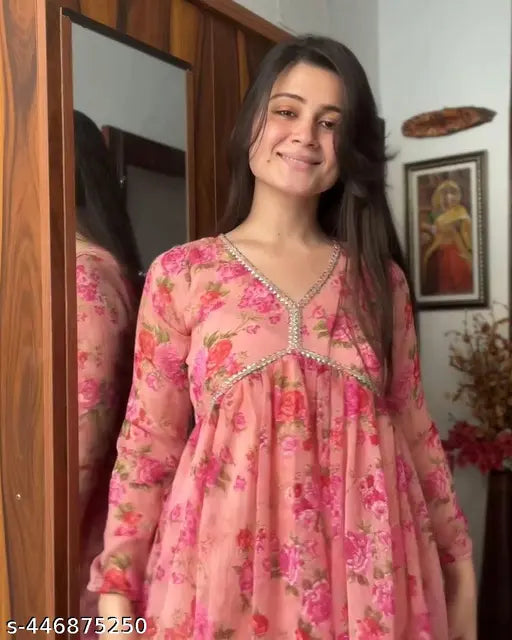 Exquisite long-sleeved printed net Georgette gown with floral design, full cotton lining and 3/4 sleeve, from DHYAN FASHION HUB. Comes with contrast matching silk dupatta