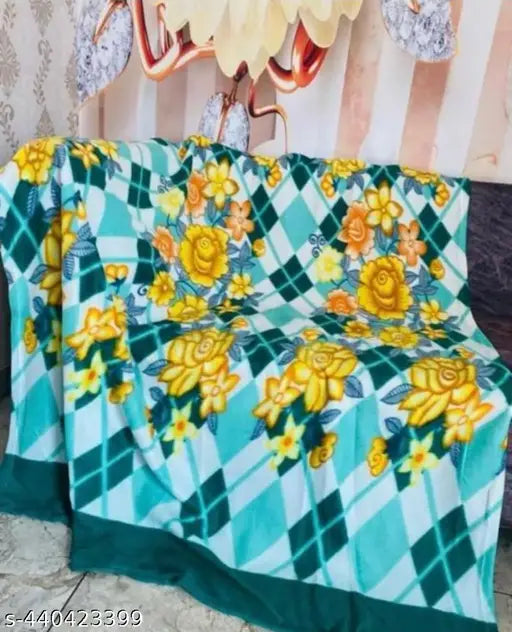 Green fleece BMK Panipat Traveller floral print blanket, ideal for camping or picnics on grass