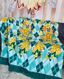 Green fleece BMK Panipat Traveller floral print blanket, ideal for camping or picnics on grass