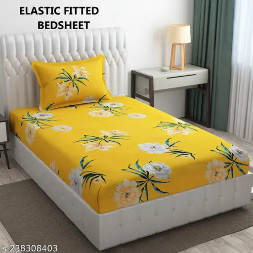 Floral printed cotton single bedsheet with pillow covers, vibrant yellows and patterns ideal for summer