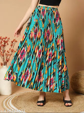 Polka dot pleated skirt for girls, crepe fabric, long length with pockets, ideal for school and playdates. Colors: White & Black, Pockets included. Indian made