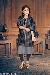 New cotton kurtis with checked pattern, three-quarter sleeves for kids aged 6-15 years. Indian made cotton clothing on model
