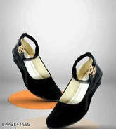 Attractive black synthetic bellies for women & girls: Solid black mesh net heel sandals with rounded toes and closed back, suitable for casual wear. Made in India, size options available from IND-4 to IND-8