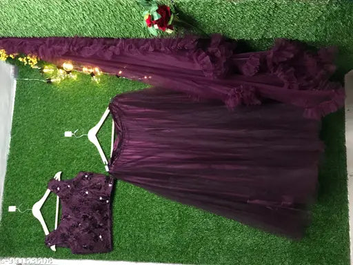 Trendy wine-colored acrylic lehenga choli with net dupatta, embellished for women and girls partywear