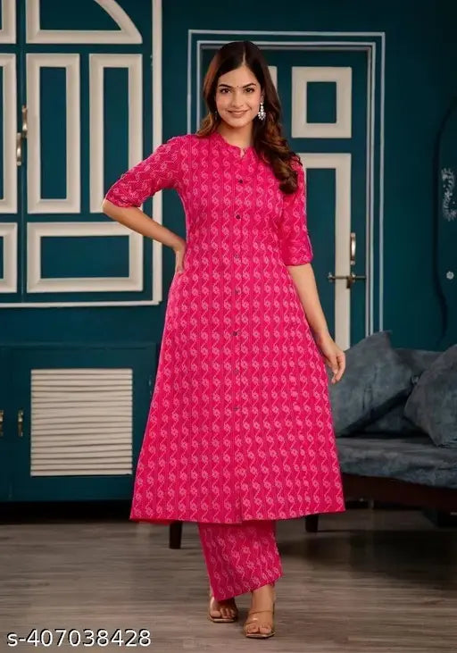 Pink cotton A-Line Katha Work kurta set with palazzos, Indian office wear in three-quarter sleeves, pink color fabric