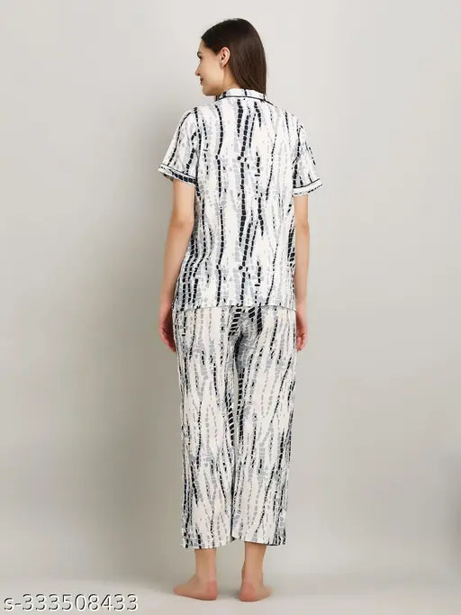 Tie dye cotton night suit with short sleeves, vibrant printed pattern. Quality fabric for year-round comfort. Available sizes: S-XXXL. Made in India