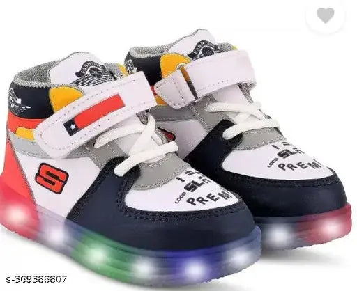 Modern Kids boys canvas shoes with rubber soles and velcro fastening, memory foam insole. Ideal for boys aged 18 months to 7 years. Printed net design. Made in India