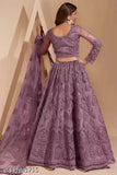 Purple embroidered semi-stitched lehenga set with choli and dupatta, intricate traditional Indian design