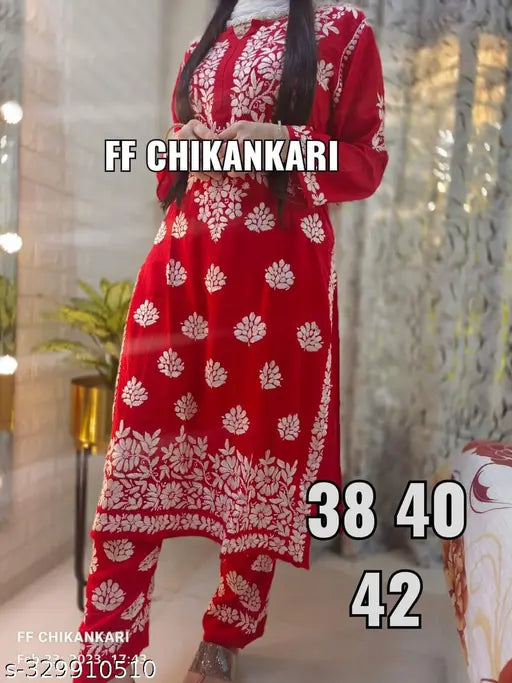 Embroidered rayon kurta and pants set with full embroidery, festival special, three-quarter sleeves on display stand