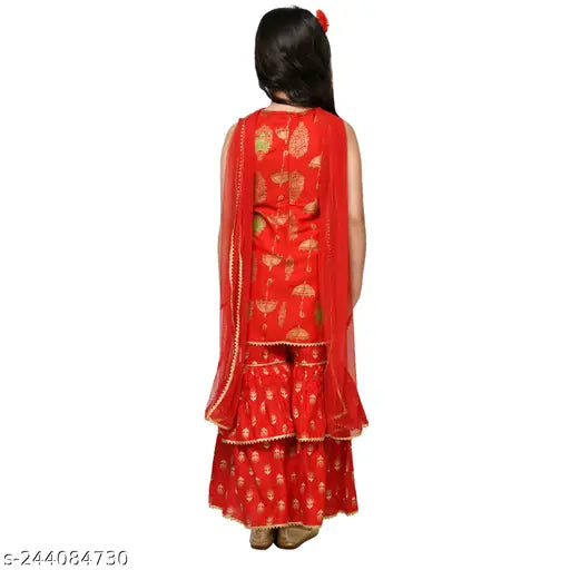 Red rayon Sharara set with C-Cut, trendy girls' clothing on display in printed net pattern