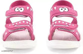 Synthetic KAT TOY shoes for kids, printed net design in various sizes: 6-9M, 9-12M, 12-18M. Perfect for active play with Velcro fastening and back detail. Made in India