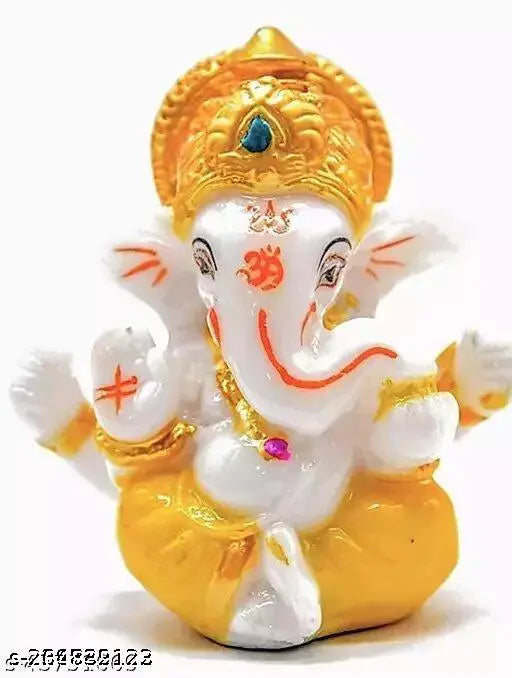 Handcrafted Multicolor Polyresin Ganesh Idol for car dashboard or home decor, symbolizing blessings, prosperity, and happiness