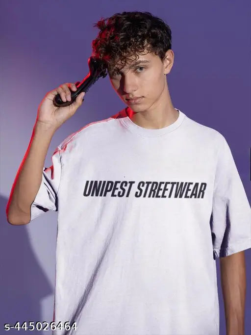 White oversized UNIPEST T-shirt, 100% cotton, front & back graphic prints, laid-back style