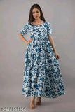 Blue rayon anarkali kurti for girls/women, short-sleeved floral print combo on Indian woman in casual setting