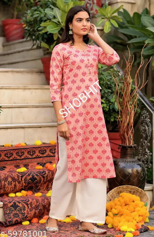 Attractive pink rayon kurta set with palazzos, three-quarter sleeves - Indian gold print design