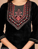Black velvet kurta with ethnic embroidery, three-quarter sleeves. Women's winter wear from India
