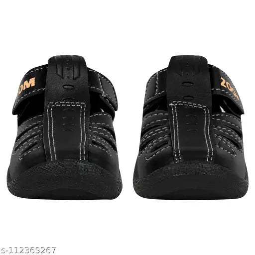 Black PVC summer sandals for kids by Kick Up, featuring Velcro fastening and a soft comfortable fit