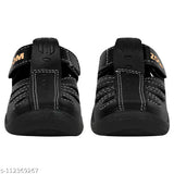 Black PVC summer sandals for kids by Kick Up, featuring Velcro fastening and a soft comfortable fit