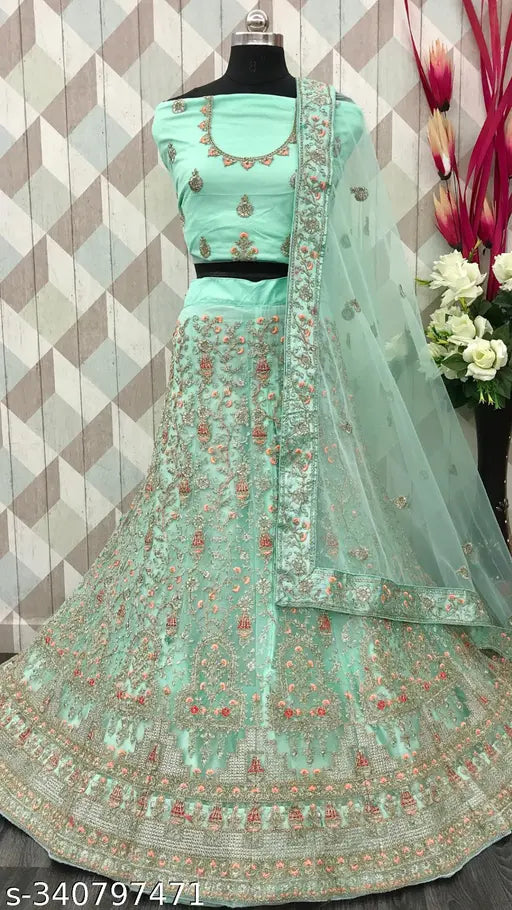 Heavy sky blue net lehenga with intricate embroidery, perfect for festive occasions - Indian designer wear