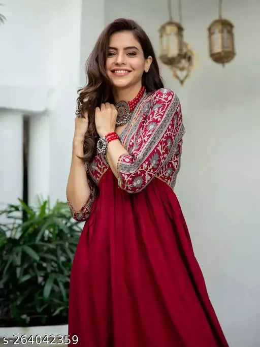 Maroon rayon printed Anarkali kurti with three-quarter sleeves, women's fashionable Indian attire on display