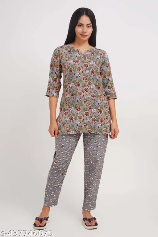 Women's beautiful floral printed rayon night suit with three-quarter sleeves, rayon bottom, and various sizes available for purchase