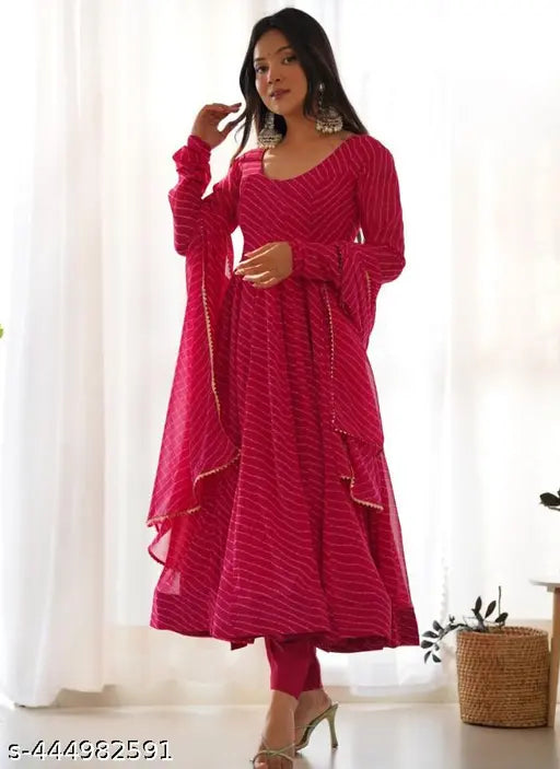 Diwali designer pink leheriya gown in georgette, embroidered net pattern, long sleeves. Indian women's formal wear with matching dupatta