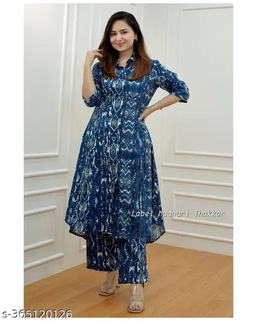 Blue floral printed cotton Anarkali gown with elegant design and three-quarter sleeves, ideal for casual daily wear