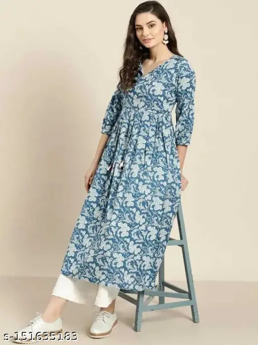 Rayon printed net kurta with palazzos, three-quarter sleeves, and western design for women. Available in sizes XS, S, M, L, XL, XXL
