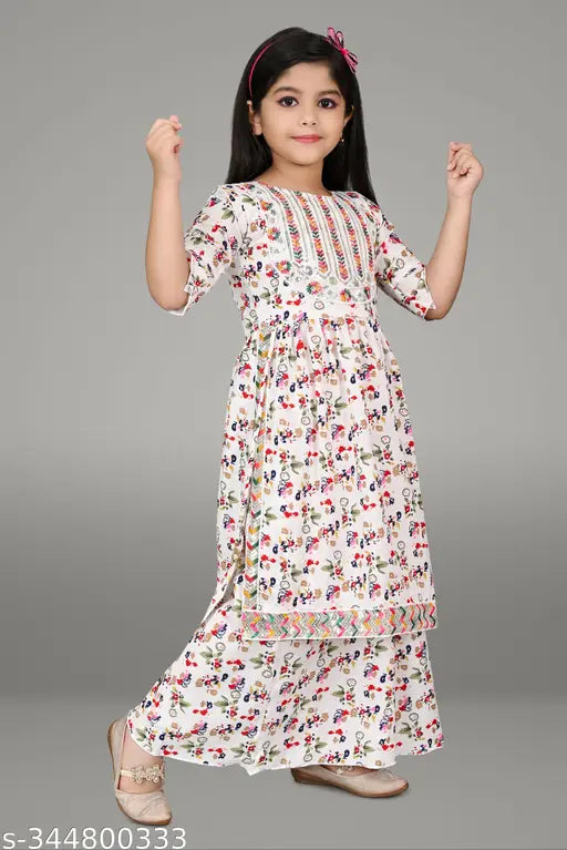 Modern girls kurty & palazzo set, printed A-line sharara with three-quarter sleeves. Soft cotton blend fabric, good quality and comfortable fit for kids ages 4-12 years. Indian origin