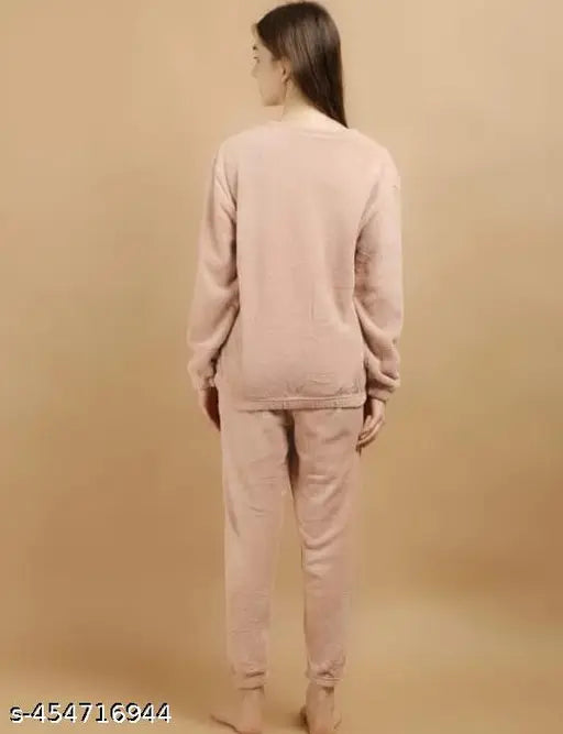 Wool night suit plain - solid wool sleepwear for men and women, long-sleeved pyjamas set on display