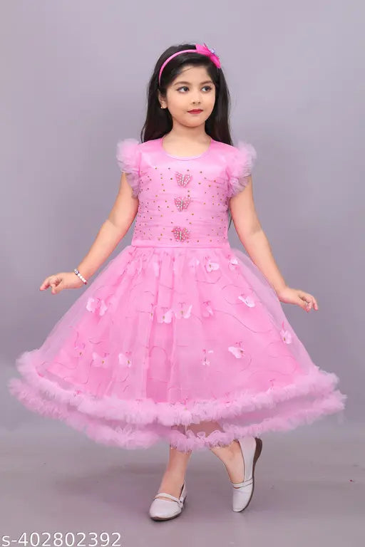 Pink net knee length frock for girls, sleeveless, embellished design, A-line silhouette, Indian origin