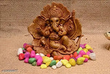 Brown resin Ganesh shoeflower idol, perfect for car dashboard puja ghar