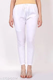 White cotton lycra pants with floral computer embroidery, Indian Chikankari design on display