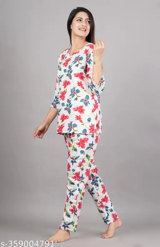 Women's printed rayon nightsuit with three-quarter sleeves and pyjama bottoms, featuring vibrant print on rayon fabric