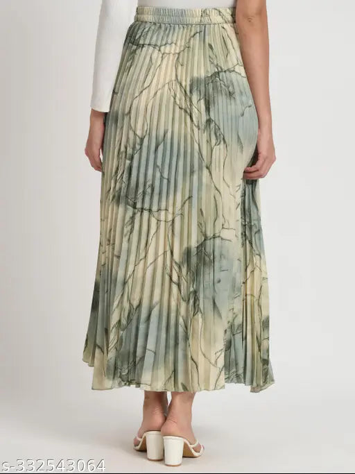 Premium polyester printed A-line skirt with pleated design and elastic waistband. Indian craftsmanship for versatile, comfortable wear