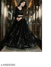 Fancy black embroidered lehenga choli with net fabric, ideal for evening events and women's wedding wear. Black festive garba lehenga from India