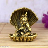 Gold-finished aluminum Krishna Idol Ladoo Gopal cover shesnag for pooja and decorative showcase, traditional Indian religious artwork on display