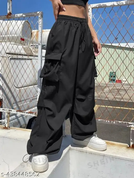 Black polycotton NS pant for girls, high-waisted casual cargo style with solid pattern. Perfect for a beautiful lady or a thoughtful gift. Fashionable and comfortable, ideal for various occasions