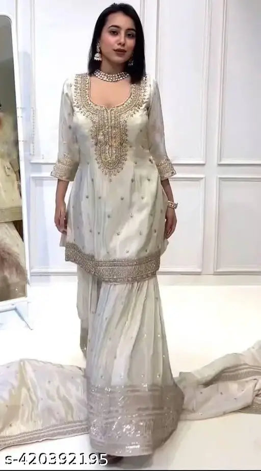 White women's embroidered silk Kurta set with matching Gharara, heavy micro cotton lining and elastic, three-quarter sleeves, India origin