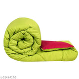 Red & Green 250 GSM Microfiber Reversible Comforter (100x90 inch), luxurious plush comforter on bed