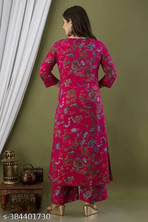 New pink viscose rayon serwani with printed net pattern, three-quarter sleeves, and palazzos bottomwear. Viscose rayon fabric from India