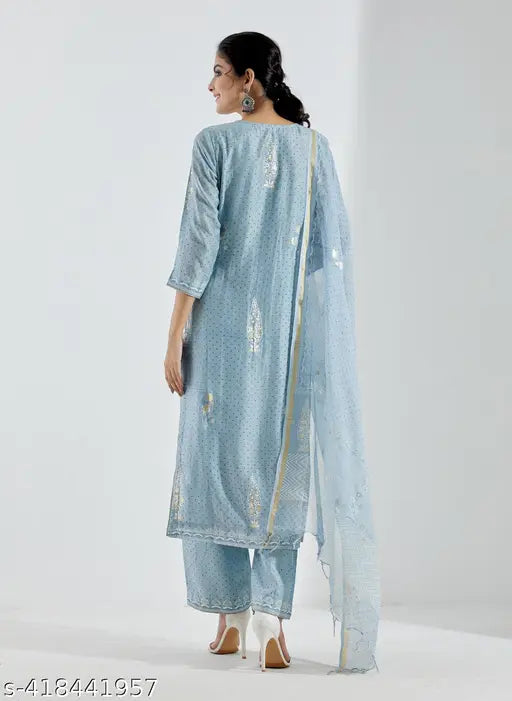 Blue cotton blend kurta set with palazzos and dupatta, printed net pattern, three-quarter sleeves. Women's size M and L available. Made in India