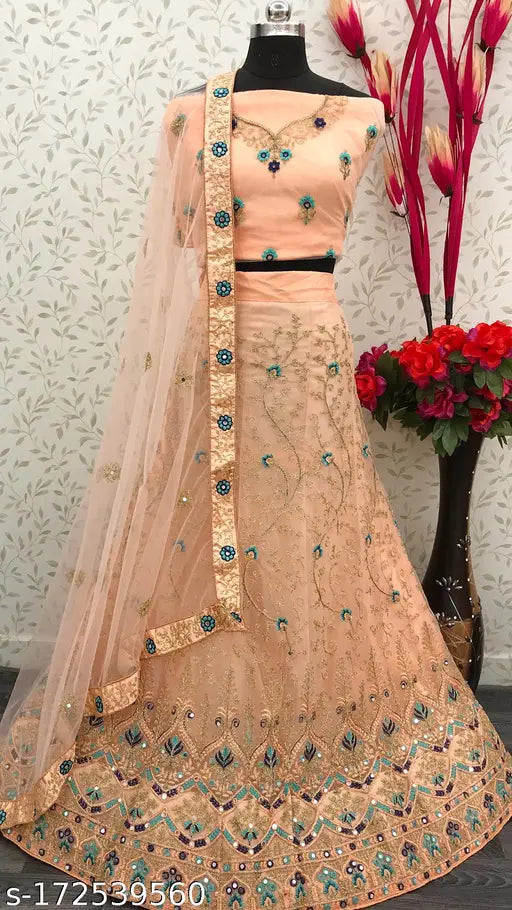 Peach net Lehenga-Choli with exquisite embroidery work - ideal for weddings & special occasions. Indian handcrafted Lehenga set