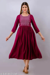 Embroidered viscose rayon A-line kurta with three-quarter sleeves, Indian women's fashion in vibrant colors and prints